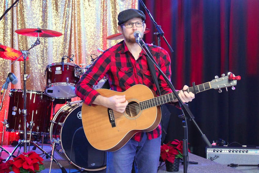 Cape Breton singer-songwriter Jason MacDonald performs during the 56th Christmas Daddies Telethon broadcast live from the Membertou Trade and Convention Centre. The Maritimes annual telethon helps less fortunate children to have a better Christmas. As part of the fundraisers, toys and gifts are distributed through registration with the Salvation Army.