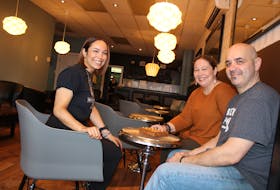 Machaela Black, her mother Monica and father Michael are shown in the newly renovated lounge area of the Black Spoon Bistro in North Sydney. Renovations for the popular restaurant have also included an expanded eating area.