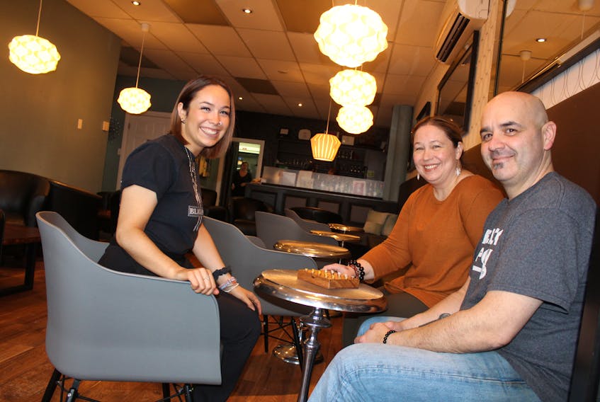 Machaela Black, her mother Monica and father Michael are shown in the newly renovated lounge area of the Black Spoon Bistro in North Sydney. Renovations for the popular restaurant have also included an expanded eating area.