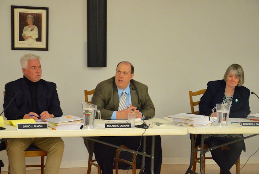 Members of the Nova Scotia Utility and Review Board are shown during a public hearing for Beinn Bhreagh, the former estate of Alexander Graham Bell, at the Royal Canadian Legion in Baddeck on Tuesday. The owners believe the property valuation for the Baddeck estate is too high. No decision was made at the hearing. From left, David Almon, Roland Deveau and Roberta Clarke.