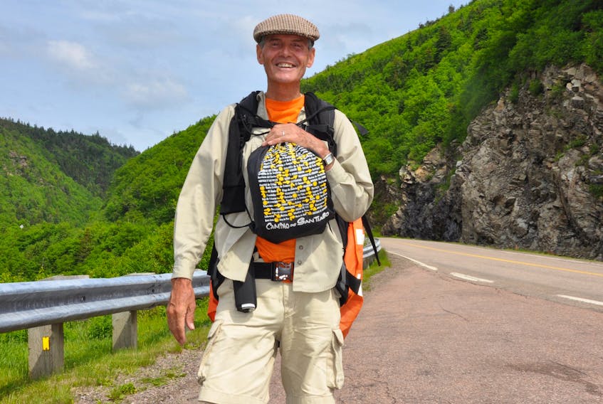 Keith Burton-MacLeod is shown walking the Cabot Trail in June 2016. The Cape Breton native finished his third pilgrimage of the island landmark last month.