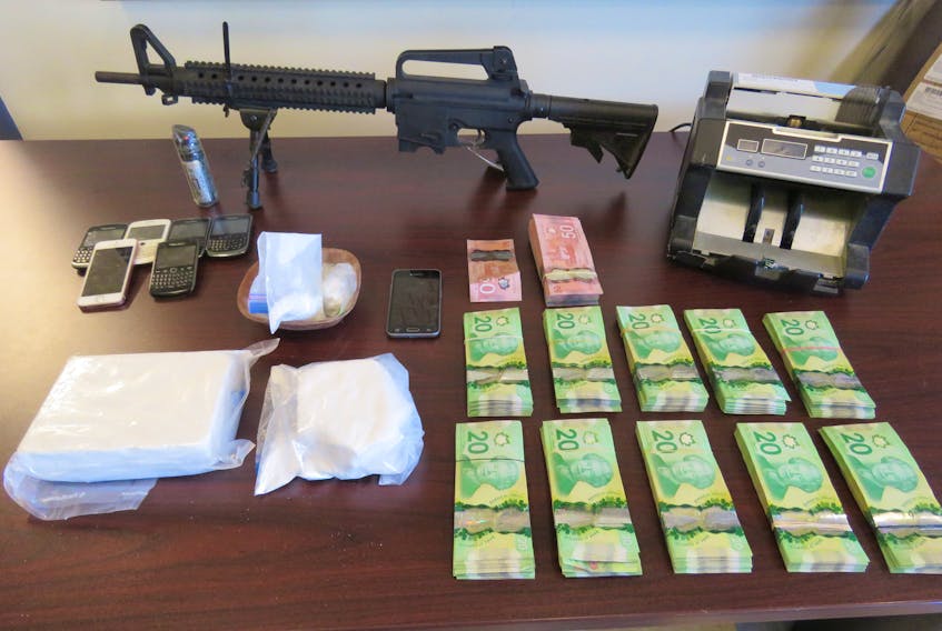 Cape Breton Regional Police seized more than $30,000 in cash, 11 pounds of marijuana and over a kilo of cocaine after searching a Hillside Road residence Tuesday. Two accused are to appear in court today for a bail hearing.