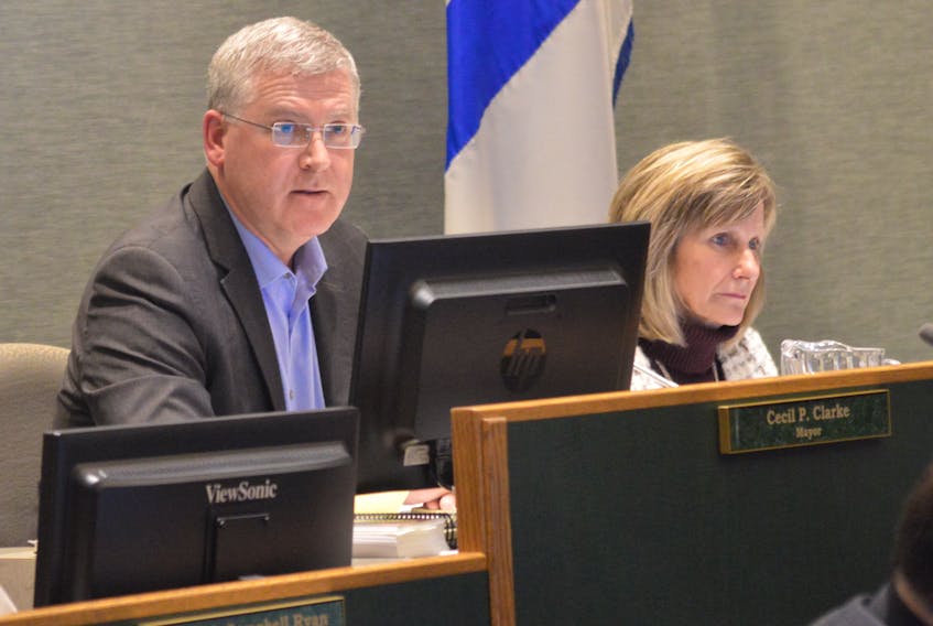 CBRM Mayor Cecil Clarke and CAO Marie Walsh are see during Tuesday's council meeting.
