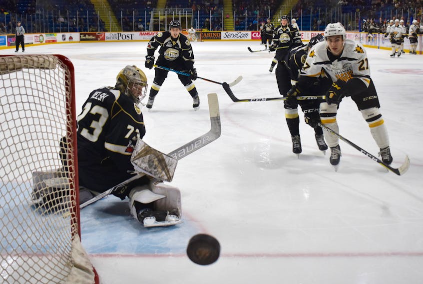 Goaltender Matthew Welsh of the Charlottetown Islanders turns aside a shot by Gabriel Proulx of the Cape Breton Screaming Eagles during Quebec Major Junior Hockey League action at Centre 200 on Friday. The Screaming Eagles won the game 4-3 in overtime.