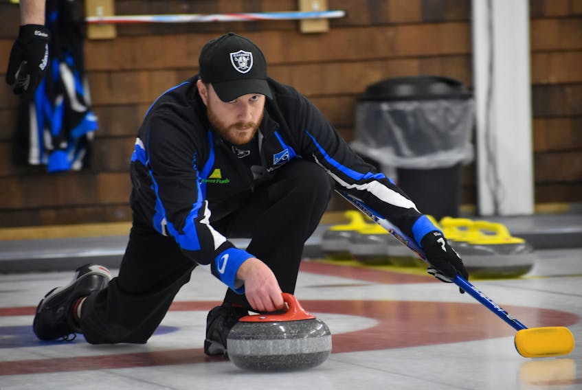 Skip Kurt Roach of the Sydney Curling Club focuses and prepares to release the rock during the Nova Scotia Men’s Travelers Curling Club Championship at the Sydney Curling Club on Friday. The Sydney rink was defeated on Day 1 of the tournament by Tony Moore and CFB Halifax Curling Club 8-2.