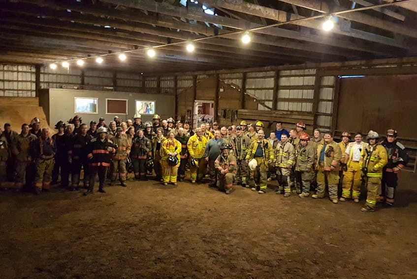 Above are all the firefighters involved in the recent mock disaster at Sunrise Stable in North Sydney.