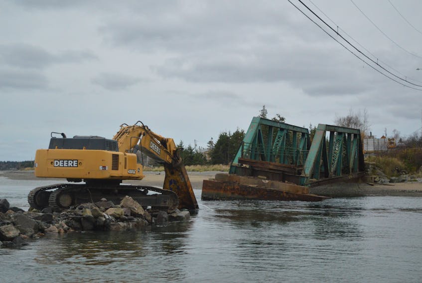 The Mira Gut bridge, which is about 140 years old was shut down this summer and is now being tore down by construction crews. CHRISTIAN ROACH/CAPE BRETON POST