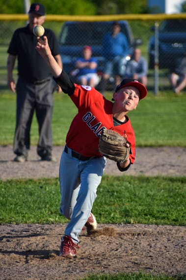 Breton Parsons of the Glace Bay McDonald’s Colonels delivers during play at the Nova Scotia Major Little League Championship at Joe Scott Memorial Field in Sydney Mines on Tuesday. The Colonels improved to 2-0 with a 9-2 win over the Sydney Sooners (1-1). Starter Ryland Hanrahan pitched five scoreless innings with 10 strikeouts in the win, while Tyler Seymour took the loss. Rory Pilling hit two triples and a single for Glace Bay, while Dylin White slapped two doubles, Luke Sinclair had two hits, Tristan Fowler hit a triple and Parsons, Hanrahan and Kale McDonald added singles. Coen Harries replied with three singles for Sydney. Seymour, Blake Herve, Brady Campbell and Noah Lecky added a single apiece. Round-robin games continue all week at 5:30 p.m. each night.