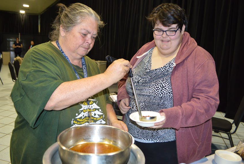 Marie McPherson of Ashby, left, and her daughter Jessica Hetrick enjoy soup at the comfort centre set up at Centre 200 in Sydney on Tuesday — their third day without power, following the devastation inflicted by a post tropical storm on Saturday. McPherson described the past few days as "horrible" As of Tuesday at 4:30 p.m., there were still 6,851 outages across Nova Scotia and 101,739 customers without power on the mainland and nearly 19,000 in Cape Breton.