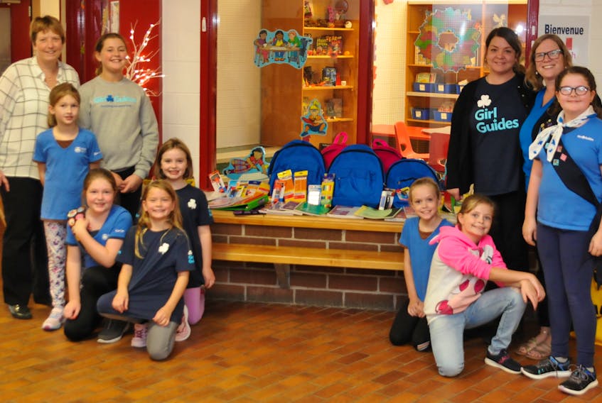 The 1st Sydney River Girl guides donated school supplies to Sydney River Elementary School on Oct. 10. This year guides are participating in various community events including collecting for local food banks. Right to left, principal Sydney River Elementary School Kelly McNenly, 1st Sydney River Girl Guides Kathleen MacAulay, Lucy Maclean, Sara Black, Bridget Nock, Mya Lundrigan, Victoria McGillivary, Cilla MacKinnon, Maddison MacDonald and Girl Guide Leaders Marilyn MacDonald and Tanya Riley.