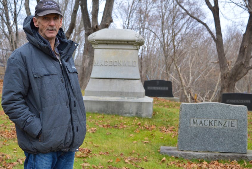Thomas MacDonald stands among the graves at Holy Cross Cemetery in Sydney, where he has been the groundskeeper for 17 years. In October, he was told his services wouldn’t be needed because the society that manages the cemetery has run out of money.