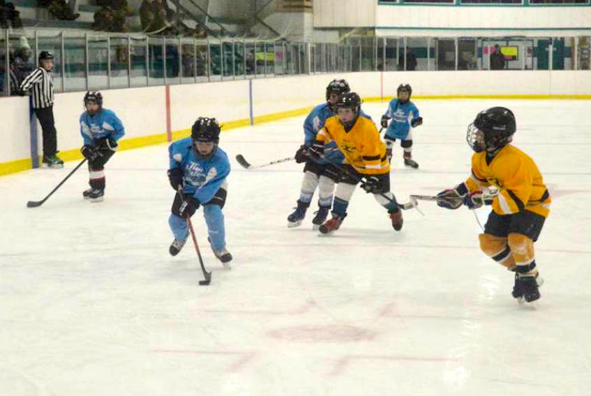 In this file photo, the New Waterford Sharks and Glace Bay Miners play a novice hockey game at the New Waterford and District Community Centre. For the second straight year, New Waterford Minor Hockey has offered free registration to first-year players from novice to midget.