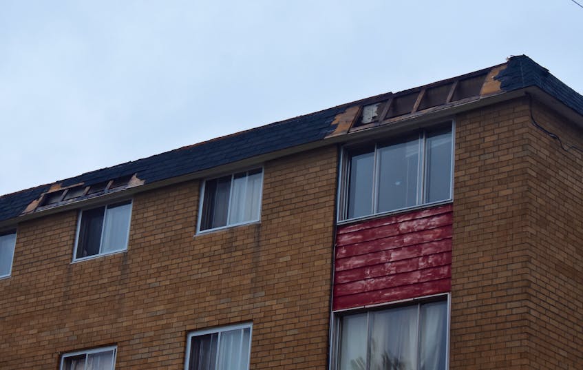 Some of the damage to an apartment complex at 297 Rotary Drive caused by Tuesday's storm. Eighteen tenants of the complex in Sydney were still displaced Wednesday, after a portion of the roof became detached.