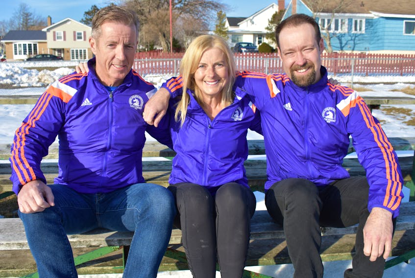 From left, Gary Ross and Donna Burns, both of Sydney, and Herbie Sakalauskas of Sydney River are among the local runners ready to compete at the 122nd edition of the Boston Marathon on Monday.