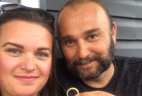 Allison and Robert Melski show off the wedding ring that was lost in Bras d’Or Lake on their first wedding anniversary in 2008. The ring was found by family members on Sept. 1, and returned to the couple on the evening of their 12th anniversary.