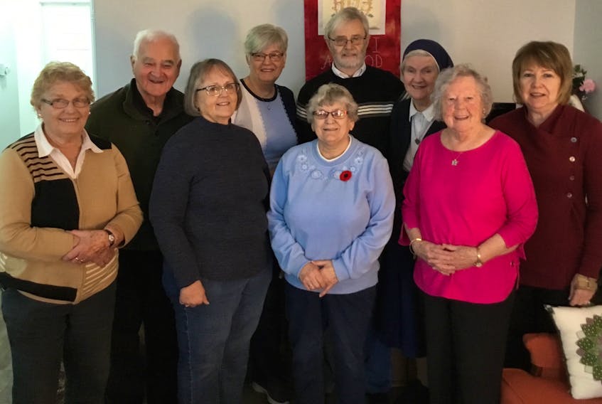 Members of the Glace Bay Adult Faith Development Committee are shown. In front, from the left, are Carmie Chiasson, Linda MacNeil, Ann Marie Boutilier, Margaret Howie. Second row, from the left, are Father Norman McPhee, Gwen Martel, David Nearing, Sr. Martha Eileen, Cathy MacInnis. Missing from the photo are Theresa Babstock, Betty Crosby, Wendy Jensen, Mary Clare Sampson.