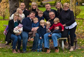 Robert McCharles, seated far right and holding grandson Charles Lapointe, smiles as he’s surrounded by his family in this photo. Also pictured, front from left, are Beth McCharles holding her daughter Allie Lapointe, David McCharles holding his son Keaton McCharles, Brady McCharles, James Lapointe and Nolan Israel. Back, from left, are Michael Israel holding Ava Israel, Jan McCharles, Ryan Lapointe, Kristi Chambers and Jeanie McCharles. Contributed/Beth McCharles