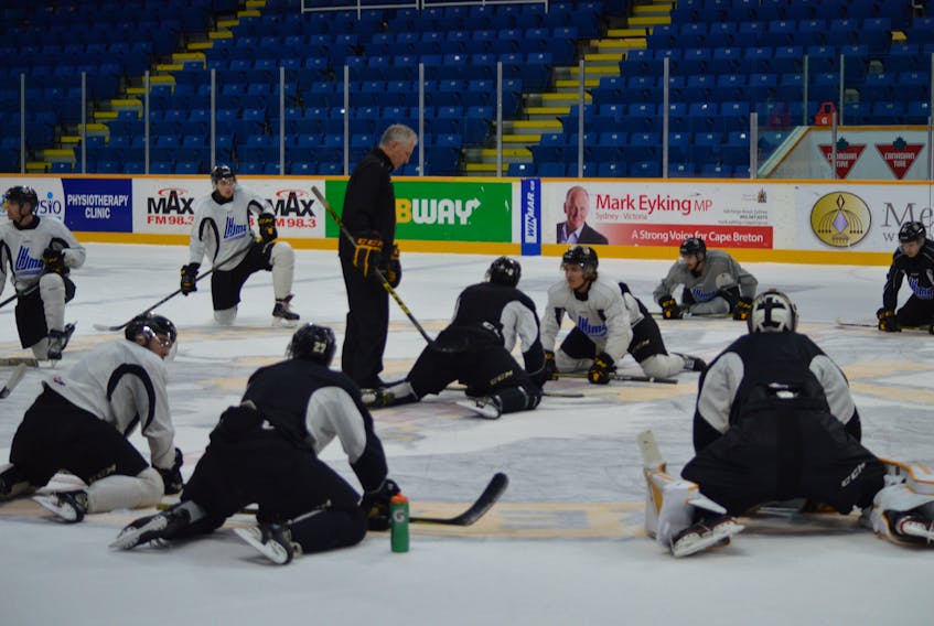 The Cape Breton Screaming Eagles are seen stretching at centre ice during a practice session on Tuesday at Centre 200 in Sydney. The Screaming Eagles play the Halifax Mooseheads at Centre 200 tonight at 7 p.m. CHRISTIAN ROACH/CAPE BRETON POST