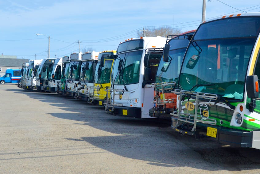 Cape Breton Transit buses sat idle at the Welton Street compound in Sydney on Monday as roads remained relatively quiet across the Cape Breton Regional Municipality. The municipal transit service continues to operate but on a more limited and regulated basis. The latest measures include a limited number of passengers per bus to adhere to the social-distancing regulations now in place due to COVID-19 restrictions. DAVID JALA/CAPE BRETON POST