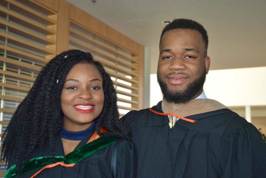 Sister and brother Louisa and Louis Esangbedo from Nigeria graduated Saturday from Cape Breton University and both enjoyed the experience so much, they’re remaining here.