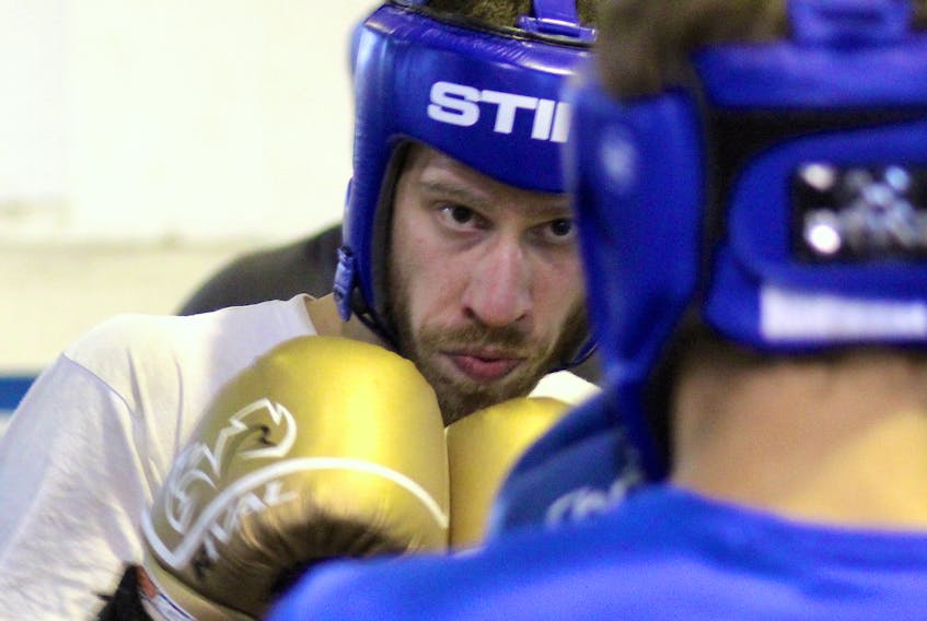 Jonathan Sinclair spars at the Membertou Boxing Club on Monday as he prepares to compete at Toe-to-Toe on Saturday night. He is one of eight host boxers set to compete on the 12-fight card at the Membertou Trade and Convention Centre.