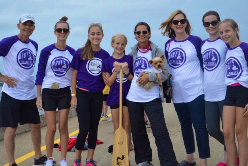 Lorne Gillis, from left, Chelsea Gillis, Sarah Madore, Kate Anderson, Bernadette Gillis, Belinda O’Brien, Kelly O’Brien and Kayleigh Anderson of Ardy’s Islanders pose for a picture at the 10th annual Cape Breton Unionized Trades Dragon Boat Festival on Saturday.