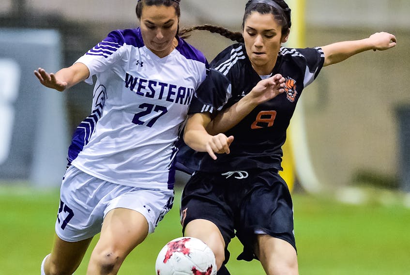 Ciera Disipio, right, of the Cape Breton University Capers, is seen in action in the U Sports women's soccer national championship in Winnipeg, Man., last week. U Sports Photo