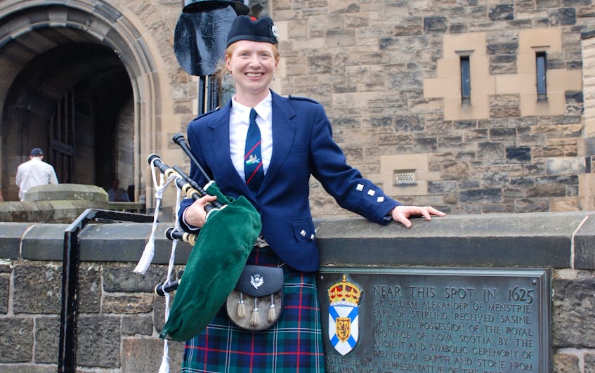Heather Murray may be from northern Cape Breton but these days she lives near Lausanne, Switzerland. Every year since 2014, she has played the pipes for a Remembrance Day service in Geneva. She is shown here in front of Edinburgh Castle in Edinburgh, Scotland.