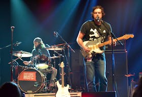 The Town Heroes are shown performing live in this file photo. Guitarist Mike, Ryan, right, is quite the comedian, as evidenced by a Facebook video of some inspired commentary over a Tessa Virtue-Scott Moir figure skating performance at the Olympics.