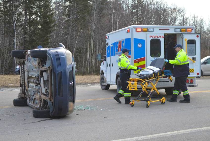 An EHS ambulance responds to an accident scene in this file photo. The union that represents paramedics and lifeflight nurses in Nova Scotia is raising concerns over what it says is a longstanding but increasingly acute problem with ambulance shortages caused by delays in admitting patients at hospital emergency departments.
