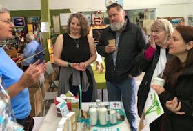 Joan McNeil, from left, of Scrub Inspired, describes the Glace Bay-based company’s products as Pauline Singer of the Cape Breton Farmers Market on Keltic Drive leads participants Allen McCormick, Delores MacDonald and Aimee Wilson on a tour to meet vendors and learn about their products as part of the annual Upskilling Food Festival and Conference on Saturday. The four-day festival, which promotes local food, wrapped up Sunday with a full day of workshops at Cape Breton University.