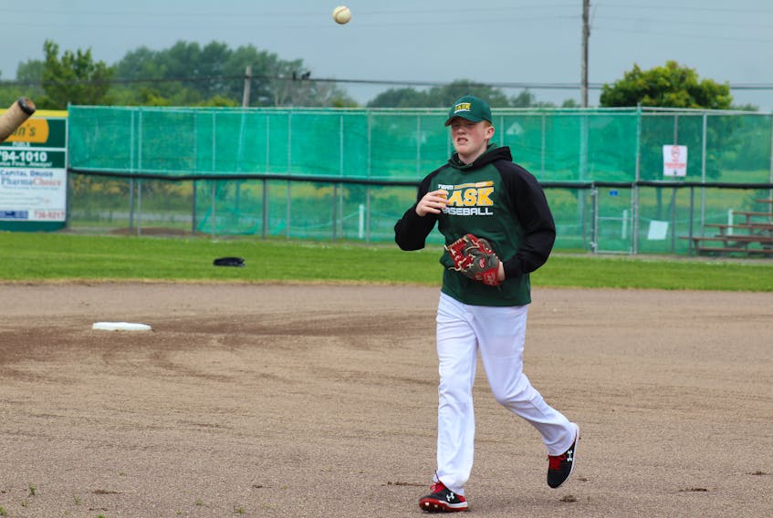 Connor O’Brien jogs across the field in Sydney Mines prior to his team’s game against Quebec at the Canadian Senior Little League championship. The Glace Bay native is competing for Team Saskatchewan at the tournament.