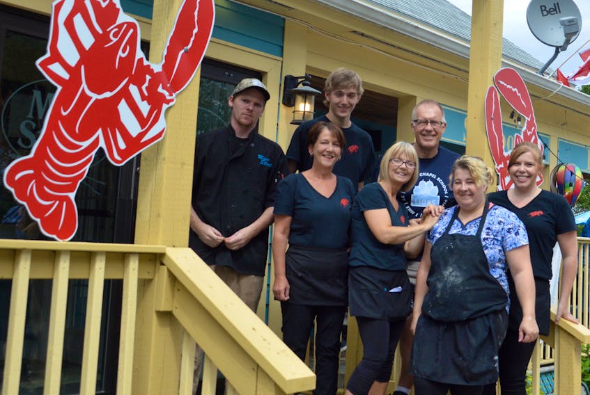 The owner and staff at Main Street Restaurant and Bakery take time for a quick photo during a busy lunch hour on Aug. 27. The Ingonish eatery is only one of many small businesses around the island who have had a hard time staying open because they can’t find enough staff. Pictured, front row, from left, are Vivienne Clark (server), Sherry Hadley (server) and Amy Schultz (bakery). Back row, from left, Mike Sheaves (chef), Bryden Fitzgerald (server), Gary Schultz (owner) and Anna Schultz (server).
