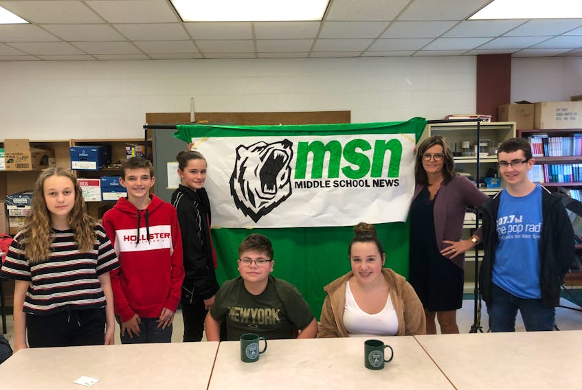 Members of the Breton Education Centre Middle School News team pose for a picture on Thursday. The group produces weekly and monthly newscasts for middle school students. From left, Rebecca Bishop, Nicholas Kearney, Meghan Muise, Albert Chiasson, Maya Duhamel, Vanessa Canova and Adam MacLean.