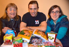 Steven MacNeil, centre, vice-chair of the New Aberdeen Revitalization Society, shows some of the items already donated for Buddy’s Garden, a community garden the society is starting at Victoria Haven Nursing Home in Glace Bay. Also shown are Rev. Marian Lucas-Jefferies, left, of Collieries Parish and Emily Angelo of Glace Bay. Lucas-Jefferies and Angelo are two of several community partners who jumped aboard to help. The garden is being named after Angelo’s late grandfather Arthur (Buddy) Payne, who loved to garden.