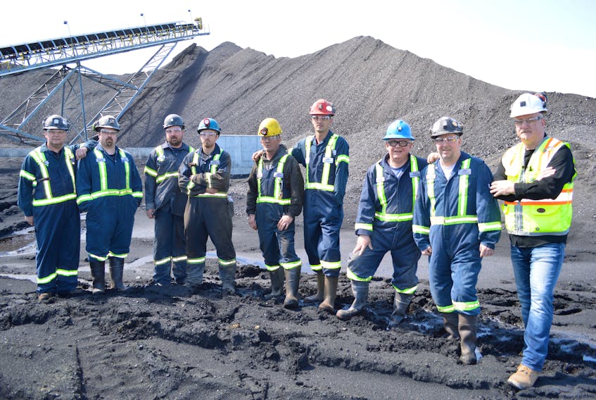 Production at Donkin Mine is not only growing but also has a number of fathers and their sons employed there, including from left, John Matheson and his son Keith Matheson, Danny Durando and his son Robert Durando, Willie Thomson and his son Chris Thomson, Neil MacKinnon Sr. and son Neil MacKinnon Jr., and Wayne Scheller, whose son Wyatt Scheller is away this week.