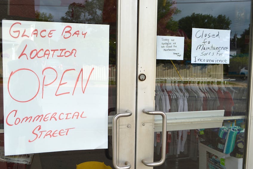 Signs on the door of the Bargain Shop in New Waterford indicate the business is closed due to maintenance issues. Officials are currently waiting for an environmental engineer report to find out the extent of repairs or work needed and sources say mould is suspected.