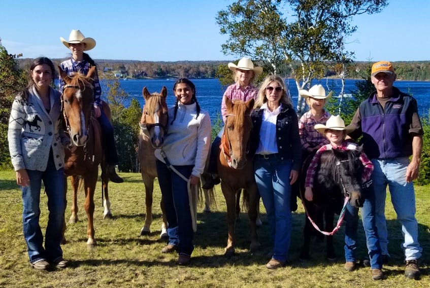 Members of the Reginato family took part in the recent Mira Ferry Fair including Lawrence Reginato, right, his daughter Laurie Don, fourth from right, and from left, niece Callie and grandchildren, Jacie, Faith, Addison, Leighton and Harlan.