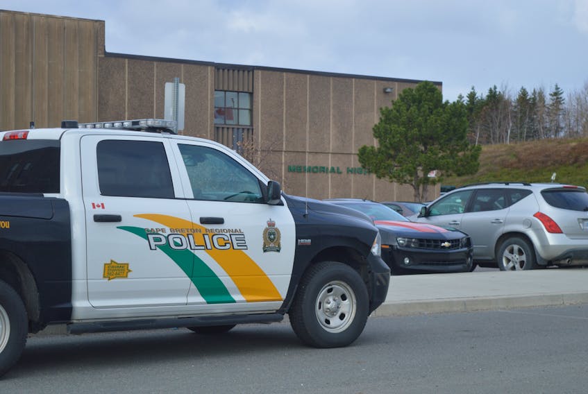 A Cape Breton Regional Police vehicle is shown parked in front of Memorial High School in Sydney Mines on Wednesday. JEREMY FRASER/CAPE BRETON POST
