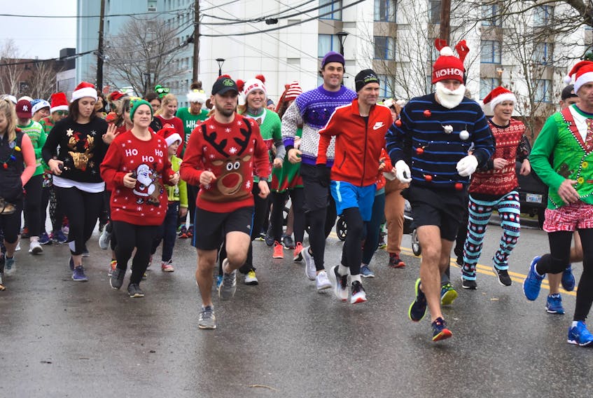 Runners of all levels, in their Christmas outfits, take off at the start of the 8th annual Ugly Sweater Run in Sydney on Dec. 15. The event raises money for Cape Breton Transition House to help women and children in need who have been clients or currently are clients of the organization which helps victims of domestic violence. More than 80 people took part in the 2019 run, despite high winds and light rain, and along with gifts of toys and jewelry organizers raised $850. "It's a really good year," stressed organizer Wendy Martin, with a smile. Martin said along with good turnout, the cash amount raised at the 2019 event might be the largest amount raised to date. Currently there are six children and eight women staying at the Transition House shelter plus six children and seven women at their Second Stage Housing. In 2018, 147 women and 47 children stayed at the Cape Breton Transition House shelter.