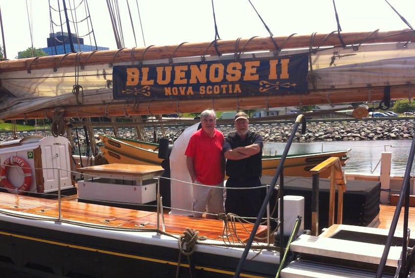 Gerald MacDonald’s days of using Nova Scotia’s famed fishing schooner, Bluenose II, as an excuse are over. MacDonald toured the vessel last weekend with Captain Phil Watson, right, after his first opportunity to be aboard the vessel was denied 44 years ago.