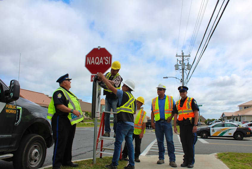 Two new stop signs were unveiled at the corner of Towerview Road and Maillard Street in Membertou on Tuesday morning. The new four-way stop that’s now in place in that area is meant to slow traffic and provide safer transportation to the Lanes at Membertou and Towerview Place, and safer crossings for those walking, biking and driving in the area. Traffic in the area has increased since the opening of the new bowling alley. At the unveiling of the new stop signs, from the left are, Cape Breton Regional Police Service Sgt. Barry Gordon, Terry Tuplin, Aaron LeRoux, Vance Kabatay, Peter Stevens, Membertou Health and Safety, Cst. Roddie Christmas.