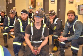 Donkin Mine coal miners listen during a safety talk before heading underground to work, in this file photo of the Cape Breton Post. The Nova Scotia Department of Labour had issued a stop work order at the mine following another rock fall July 8. The order was lifted Monday night.