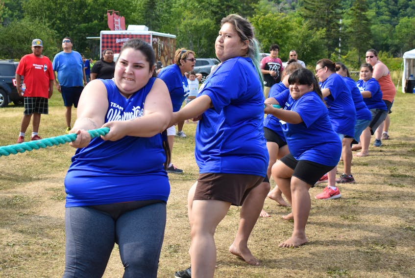In this file photo, Lateesha Denny, left, and Rebecca Peck, lead their Wagmatcook teammates in a game of tug of war during last year’s Nova Scotia Mi’kmaw Summer Games in Eskasoni. The 2019 edition of the games will be held in Waycobah, beginning on Sunday.