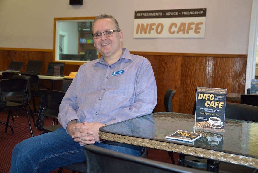 Pastor Rob Jones sits at a table where the Info Café will happen every Tuesday at Faith Baptist Church on Davenport Street in Sydney. It will be a “one stop shop” for people looking for advice on housing, benefits, relationships, employment and money. There will be free refreshments and one-meal food bags available. NIKKI SULLIVAN/CAPE BRETON POST