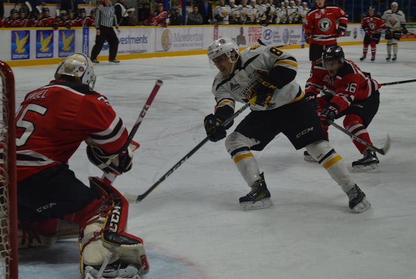 Cape Breton Screaming Eagles captain Phélix Martineau is denied on a short-handed breakaway by Quebec Remparts netminder Antoine Samuel during the first period of Quebec Major Junior Hockey League play Wednesday at Centre 200.