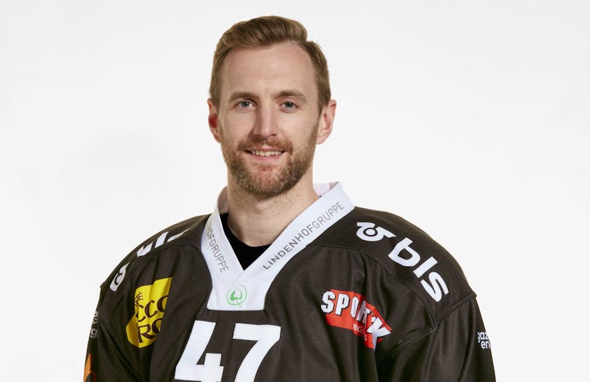Andrew MacDonald of Judique is shown wearing the SC Bern jersey. After 11 seasons in the NHL, the defenceman signed with the Switzerland team in October and appeared in 15 games with the club.