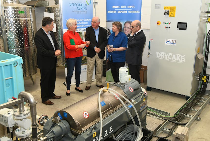 Cape Breton University’s Verschuren Centre for Sustainability in Energy and the Environment has been given a $2.4-million investment to help it turn marine byproducts into commercial products for the feed, plant and food sectors. Above, CBU chancellor Annette Verschuren, second from left, chats with Invest Nova Scotia chair Ken Deveau, board member Adrian White, centre CEO and lead researcher Dr. Beth Mason, and CBU president David Dingwall.