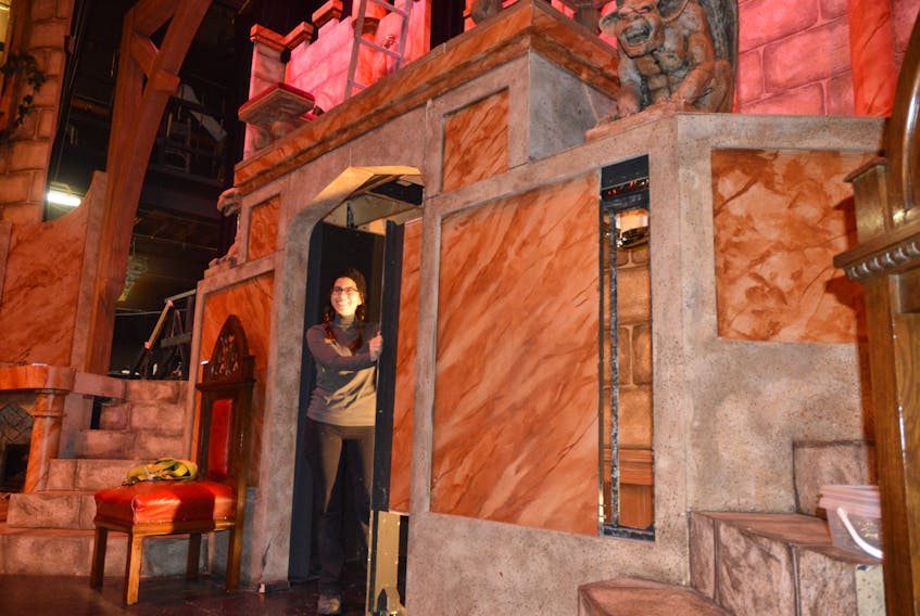 Olivia Adlakha was a member of the crew finishing up the castle that will be at the centrepiece of the Savoy Theatre’s showing of “Beauty and the Beast.” The three-day production opens on Friday at the Glace Bay venue. GREG MCNEIL/CAPE BRETON POST