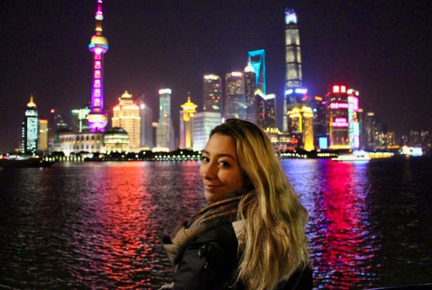 Jillian Chisholm looks at the Shanghai skyline. The former Pleasant Bay resident is now teaching in the world’s largest city.